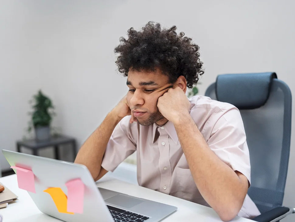 Frustrated employee at desk